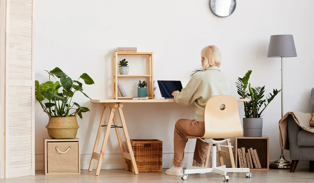 Remote worker at a desk with a laptop