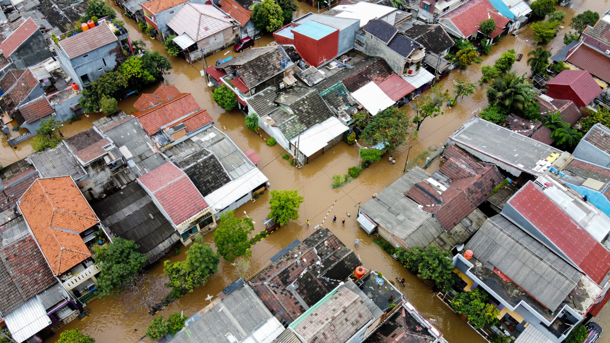 City skyline representing climate risk to real estate assets