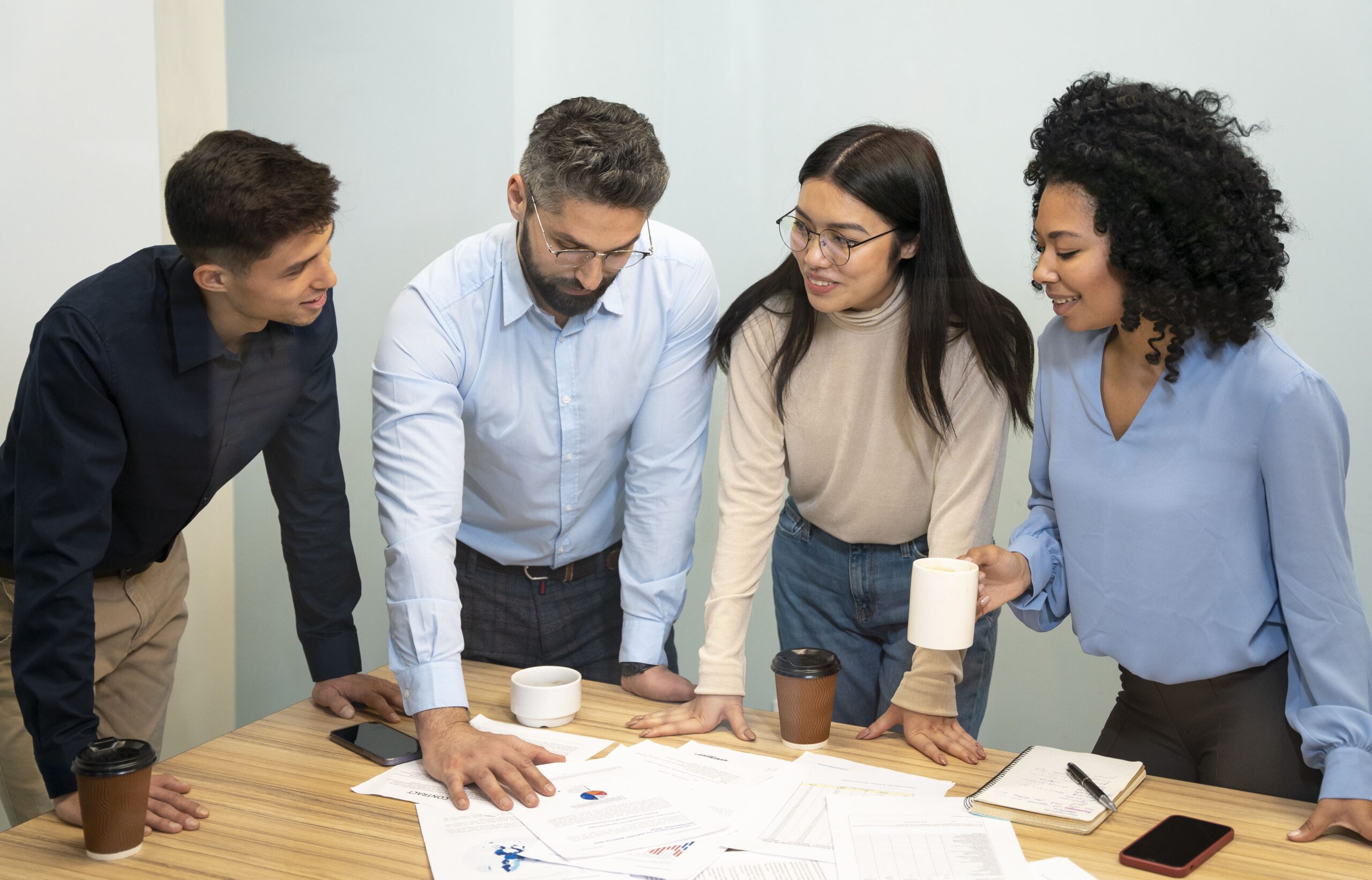 Project team working together around a table