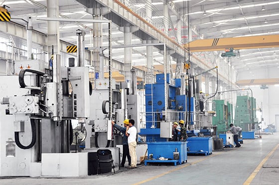 Mechanical engineer working with industrial machinery